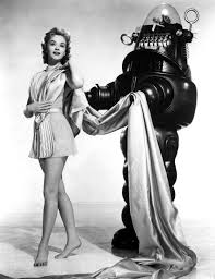 Publicity shot of Anne Francis with Robby the Robot